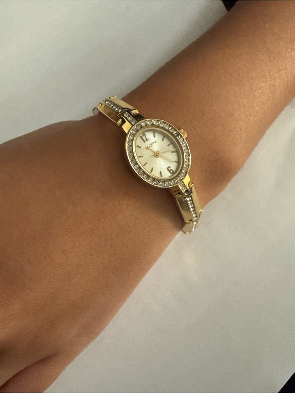 Gold Crystal-Trim Women's Bracelet Watch with Champagne Dial